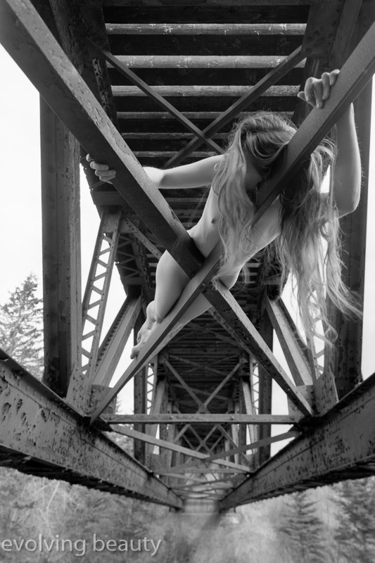 How to create nude art photography nude art model on a bridge