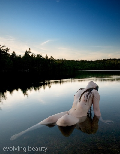 How to create nude art photography wet nude art model in a lake under the sky